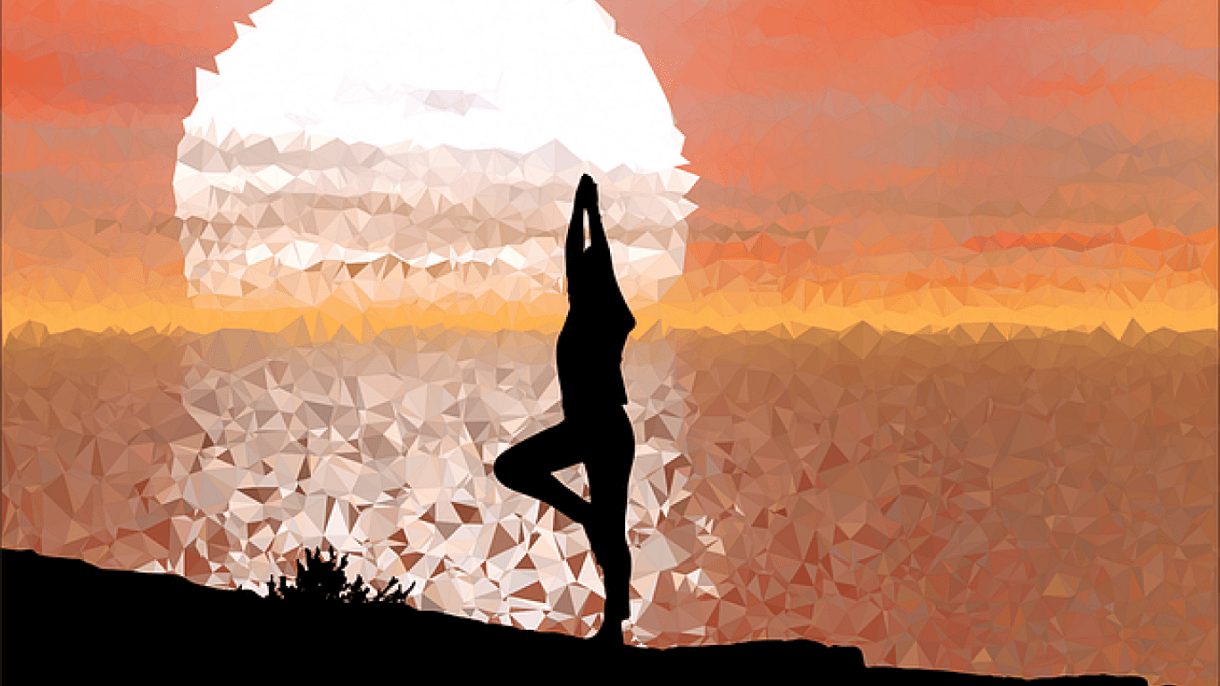 Woman doing yoga on a beach at sunset - a peaceful and relaxing way to connect with nature.