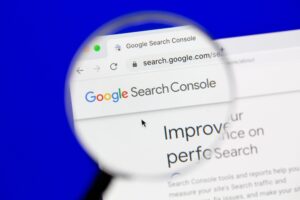 Magnifying glass with Google Search Console in focus.